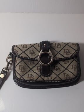 Classic Dooney And Bourke Beige and Black Monogram Wristlet